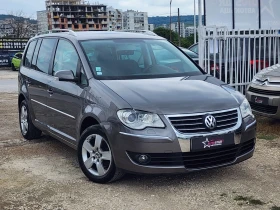 VW Touran 2.0TDI DSG 6+ 1 - Car24.bg VW Touran 2.0TDI DSG 6+ 1