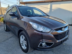 Hyundai IX35 2.0 бензин/163к.с/4х4/евро5а/камера/навигация/ - Car24.bg Hyundai IX35 2.0 бензин/163к.с/4х4/евро5а/камера/навигация/
