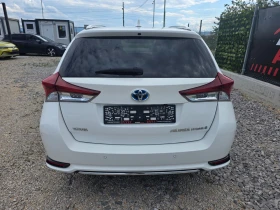 Toyota Auris II-1.8 h-Touring Sports-HYBRID-e CVT-Facelift - 8300 € / 16233.39 лв. - 23355053 5 | Car24.bg Toyota Auris II-1.8 h-Touring Sports-HYBRID-e CVT-Facelift - 8300 € / 16233.39 лв. - 23355053 5