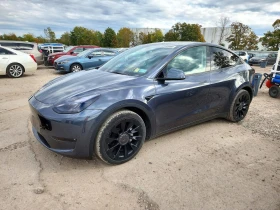 Tesla Model Y LONG RANGE 82 KWH / AWD