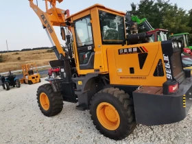 Челен товарач Komatsu Челни товарачи 2000кг | Auto.bg — изображение 3 Челен товарач Komatsu Челни товарачи 2000кг | Auto.bg — изображение 3