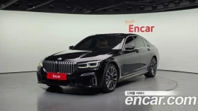BMW 740 M* SPORT* FACELIFT* ОБДУХВАНЕ* ХЕДЪП* МАСАЖ* - Car24.bg BMW 740 M* SPORT* FACELIFT* ОБДУХВАНЕ* ХЕДЪП* МАСАЖ*