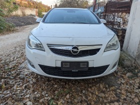     Opel Astra 1.7  cdti ~ 123 .