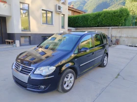 VW Touran 2.0 TDI BMM 6ск 7места Hi-Line Navi | Auto.bg — изображение 2 VW Touran 2.0 TDI BMM 6ск 7места Hi-Line Navi | Auto.bg — изображение 2