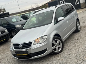 VW Touran 2.0TDI 140кс 7-места АВТОМАТИК НАВИ МУЛТИ-ВОЛАН - 8700 лв. / 4448.24 € - 75619927 3 | Car24.bg VW Touran 2.0TDI 140кс 7-места АВТОМАТИК НАВИ МУЛТИ-ВОЛАН - 8700 лв. / 4448.24 € - 75619927 3