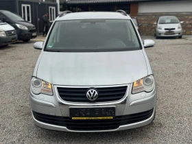 VW Touran 2.0TDI 140кс 7-места АВТОМАТИК НАВИ МУЛТИ-ВОЛАН - 8700 лв. / 4448.24 € - 75619927 2 | Car24.bg VW Touran 2.0TDI 140кс 7-места АВТОМАТИК НАВИ МУЛТИ-ВОЛАН - 8700 лв. / 4448.24 € - 75619927 2