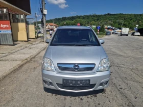Opel Meriva 1.3cdti, 75кс, 07г.Италия | Auto.bg — изображение 8 Opel Meriva 1.3cdti, 75кс, 07г.Италия | Auto.bg — изображение 8