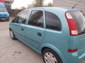 Opel Meriva 1.6клима гаражен | Auto.bg — изображение 13 Opel Meriva 1.6клима гаражен | Auto.bg — изображение 13