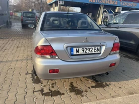 Mitsubishi Lancer 1.6 - 3300 € / 6454.24 лв. - 99446014 6 | Car24.bg Mitsubishi Lancer 1.6 - 3300 € / 6454.24 лв. - 99446014 6