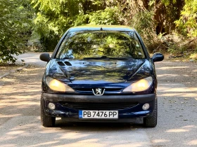 Peugeot 206 1.4 бензин 74 к.с.