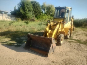 Багер Komatsu Бенфра 1.05Н | Auto.bg — изображение 2 Багер Komatsu Бенфра 1.05Н | Auto.bg — изображение 2