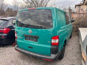 VW T5 2.0TDI + KЛИМАТИК + КЕМПЕР | Auto.bg — изображение 6 VW T5 2.0TDI + KЛИМАТИК + КЕМПЕР | Auto.bg — изображение 6