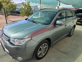 Mitsubishi Outlander 2.0i Phev-4wd /Auto/Navi/Koja/Camera/Xenon/L | Auto.bg — изображение 4 Mitsubishi Outlander 2.0i Phev-4wd /Auto/Navi/Koja/Camera/Xenon/L | Auto.bg — изображение 4