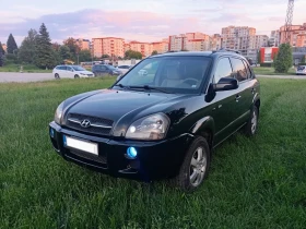 Hyundai Tucson 150кс._6 скорости_5л./100км._NAVI_Първи собственик | Auto.bg — изображение 2 Hyundai Tucson 150кс._6 скорости_5л./100км._NAVI_Първи собственик | Auto.bg — изображение 2