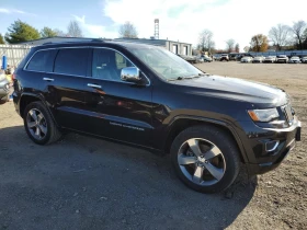Jeep Grand cherokee 5.7 HEMI V8| OVERLAND| ПОДГРЕВ| ОБДУХВАНЕ| ПАНОРАМ - 18900 лв. / 9663.42 € - 34489635 12 | Car24.bg Jeep Grand cherokee 5.7 HEMI V8| OVERLAND| ПОДГРЕВ| ОБДУХВАНЕ| ПАНОРАМ - 18900 лв. / 9663.42 € - 34489635 12