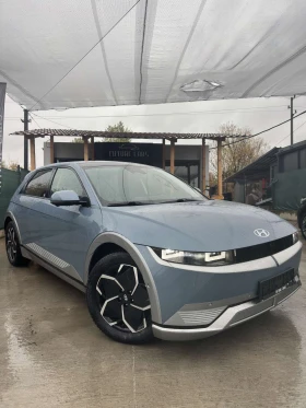 Hyundai Ioniq 5 72.6KWh/UNIQ/ГАРАНЦИЯ/360/HEADUP/BOSE/SOH100%/PANO | Auto.bg — изображение 2 Hyundai Ioniq 5 72.6KWh/UNIQ/ГАРАНЦИЯ/360/HEADUP/BOSE/SOH100%/PANO | Auto.bg — изображение 2