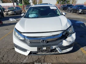 Honda Civic 2.0L I-4 DOHC, VVT, 158HP Front Wheel Drive - 8200 € / 16037.81 лв. - 74179915 13 | Car24.bg Honda Civic 2.0L I-4 DOHC, VVT, 158HP Front Wheel Drive - 8200 € / 16037.81 лв. - 74179915 13