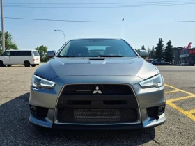 Mitsubishi Lancer * Lancer Evolution* MR* ПАНО* KEYLESS* Camera* ПОД - 19000 € / 37160.77 лв. - 64050968 9 | Car24.bg Mitsubishi Lancer * Lancer Evolution* MR* ПАНО* KEYLESS* Camera* ПОД - 19000 € / 37160.77 лв. - 64050968 9