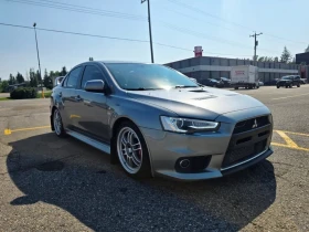 Mitsubishi Lancer * Lancer Evolution* MR* ПАНО* KEYLESS* Camera* ПОД - 19000 € / 37160.77 лв. - 64050968 8 | Car24.bg Mitsubishi Lancer * Lancer Evolution* MR* ПАНО* KEYLESS* Camera* ПОД - 19000 € / 37160.77 лв. - 64050968 8
