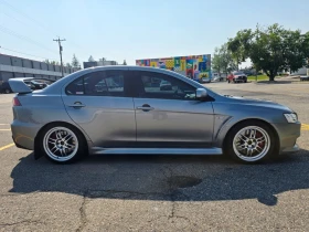 Mitsubishi Lancer * Lancer Evolution* MR* ПАНО* KEYLESS* Camera* ПОД - 19000 € / 37160.77 лв. - 64050968 7 | Car24.bg Mitsubishi Lancer * Lancer Evolution* MR* ПАНО* KEYLESS* Camera* ПОД - 19000 € / 37160.77 лв. - 64050968 7