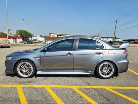 Mitsubishi Lancer * Lancer Evolution* MR* ПАНО* KEYLESS* Camera* ПОД - 19000 € / 37160.77 лв. - 64050968 2 | Car24.bg Mitsubishi Lancer * Lancer Evolution* MR* ПАНО* KEYLESS* Camera* ПОД - 19000 € / 37160.77 лв. - 64050968 2