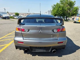 Mitsubishi Lancer * Lancer Evolution* MR* ПАНО* KEYLESS* Camera* ПОД - 19000 € / 37160.77 лв. - 64050968 4 | Car24.bg Mitsubishi Lancer * Lancer Evolution* MR* ПАНО* KEYLESS* Camera* ПОД - 19000 € / 37160.77 лв. - 64050968 4