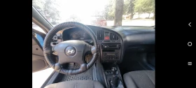 Hyundai Elantra 1.6i CNG-Метан | Auto.bg — изображение 7 Hyundai Elantra 1.6i CNG-Метан | Auto.bg — изображение 7