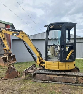 Багер Caterpillar 303C