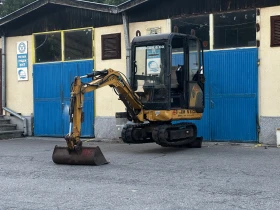 Багер Cat 301.5