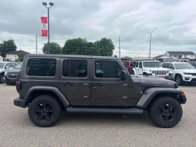 Jeep Wrangler * Sahara * CARFAX * ОПЦИЯ ЗА ФИНАНСИРАНЕ | Auto.bg — изображение 3 Jeep Wrangler * Sahara * CARFAX * ОПЦИЯ ЗА ФИНАНСИРАНЕ | Auto.bg — изображение 3