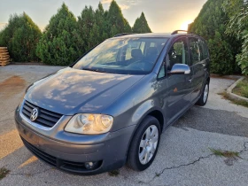 VW Touran 1.9/TDI 7местен.Нави. - Car24.bg VW Touran 1.9/TDI 7местен.Нави.