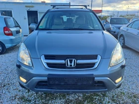 Honda Cr-v 2, 0i, AVTOMATIK, КОЖА - 8999 лв. / 4601.12 € - 27157265 2 | Car24.bg Honda Cr-v 2, 0i, AVTOMATIK, КОЖА - 8999 лв. / 4601.12 € - 27157265 2