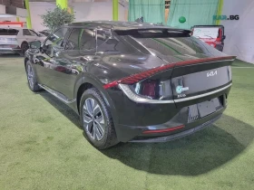 Kia EV6 WIND* RWD* ПАМЕТ* КАМЕРА* СЛЕД НА ЛЕНТИ* ДИСТРОНИК | Auto.bg — изображение 4 Kia EV6 WIND* RWD* ПАМЕТ* КАМЕРА* СЛЕД НА ЛЕНТИ* ДИСТРОНИК | Auto.bg — изображение 4