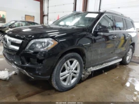 Mercedes-Benz GL 450 4MATIC* HARMAN/KARDON* ШИБИДАХ* ПОДГРЕВ* КАМЕРА - 13300 € / 26012.54 лв. - 83391965 4 | Car24.bg Mercedes-Benz GL 450 4MATIC* HARMAN/KARDON* ШИБИДАХ* ПОДГРЕВ* КАМЕРА - 13300 € / 26012.54 лв. - 83391965 4