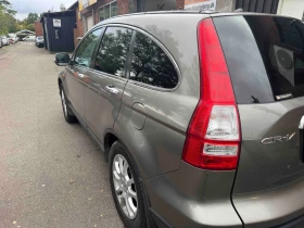 Honda Cr-v 2, 0i-4x4/АВТОМАТИК/ПАНОРАМА/КОЖА/ПОДГРЕВ/ТОП!!! - 17555 лв. / 8975.73 € - 21051177 3 | Car24.bg Honda Cr-v 2, 0i-4x4/АВТОМАТИК/ПАНОРАМА/КОЖА/ПОДГРЕВ/ТОП!!! - 17555 лв. / 8975.73 € - 21051177 3