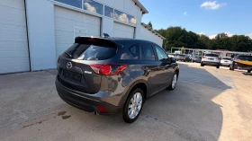 Mazda CX-5 2.2d SKYACTIV* NAVI* 106 000км* 4x4* NOVA* | Auto.bg — изображение 14 Mazda CX-5 2.2d SKYACTIV* NAVI* 106 000км* 4x4* NOVA* | Auto.bg — изображение 14
