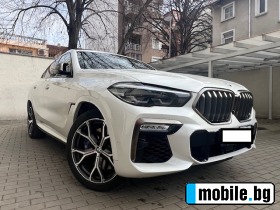     BMW X6 M50i ~ 135 000 .