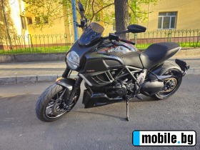     Ducati Diavel carbon ~18 800 .