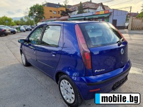     Fiat Punto 1.3M-JET 2009. ~3 999 .