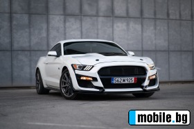     Ford Mustang 5.0 GT ~55 000 .