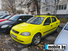     Opel Astra ~2 300 .