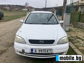     Opel Astra ~2 200 .