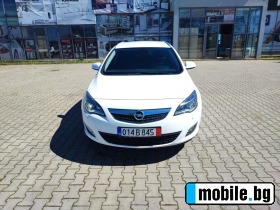     Opel Astra ~11 999 .