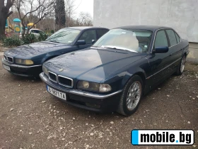     BMW 740 ~8 000 .