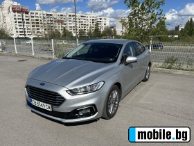     Ford Mondeo 2.0TDCI ~51 400 .