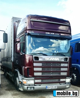     Scania 124 420  ~23 000 .