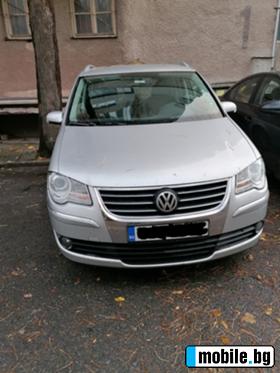     VW Touran New Face ~7 500 .