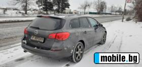 Opel Astra 2.0CDTI SPORT TOURER 165 | Mobile.bg   9