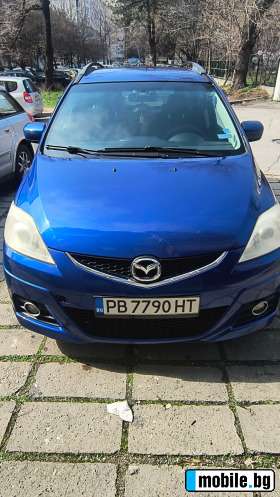     Mazda 5 ~8 000 .
