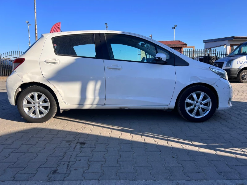 Toyota Yaris 1.0I EURO 5B, снимка 6 - Автомобили и джипове - 47894636